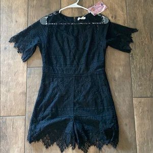 Brand new black lace romper